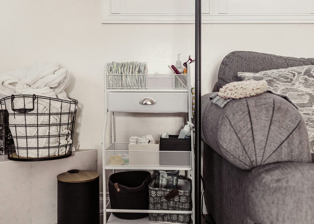 small entryway key drop zone with tray and basket